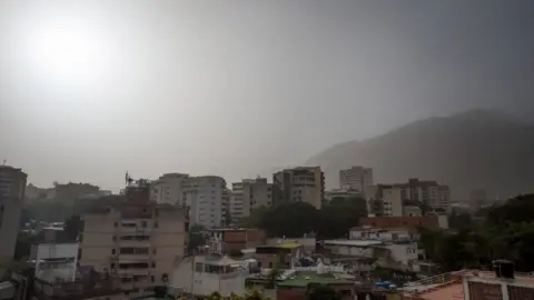 EPA Dust particles are seen in Caracas, Venezuela, 21 June 2020.