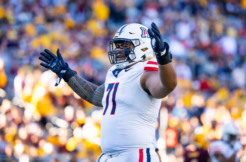 Nov 25, 2023; Tempe, Arizona, USA; Arizona Wildcats offensive lineman Jonah Savaiinaea (71) against the Arizona State Sun Devils during the Territorial Cup at Mountain America Stadium. Mandatory Credit: Mark J. Rebilas-USA TODAY Sports