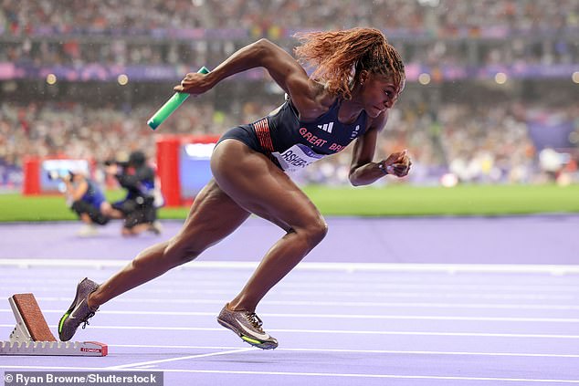 The race was marred by torrid weather conditions as rain poured down at the Stade de France