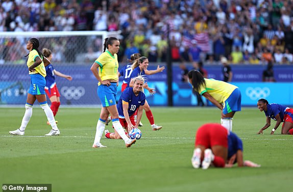 PARIS, FRANCE - AUGUST 10: Lindsey Horan #10 of Team United States celebrates victory after the Women's Gold Medal match between Brazil and United States of America during the Olympic Games Paris 2024 at Parc des Princes on August 10, 2024 in Paris, France. (Photo by Julian Finney/Getty Images)