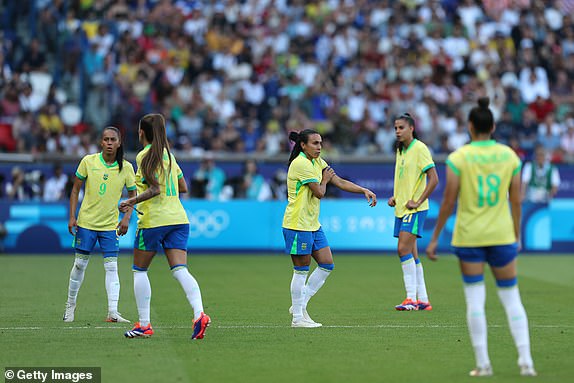 PARIS, FRANCE - AUGUST 10: Marta #10 of Team Brazil enters the pitch during the Women's Gold Medal match between Brazil and United States of America during the Olympic Games Paris 2024 at Parc des Princes on August 10, 2024 in Paris, France. (Photo by Carl Recine/Getty Images)