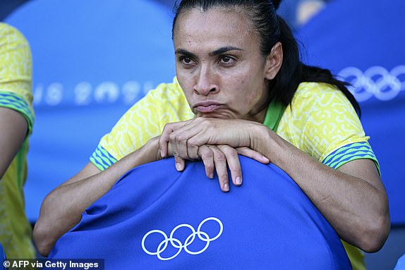 Brazil's forward #10 Marta is pictured sitting in the bench before the women's gold medal final football match between Brazil and US during the Paris 2024 Olympic Games at the Parc des Princes in Paris on August 10, 2024. (Photo by Jonathan NACKSTRAND / AFP) (Photo by JONATHAN NACKSTRAND/AFP via Getty Images)