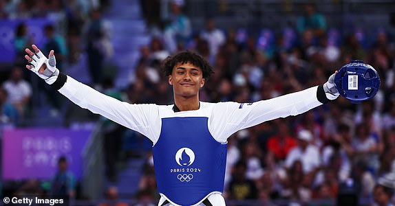 PARIS, FRANCE - AUGUST 10: Caden Cunningham of Team Great Britain acknowledges fans prior to a Men's +80kg Semifinal match against Cheick Sallah Cisse of Team CÃ´te d'Ivoire (not pictured) on day fifteen of the Olympic Games Paris 2024 at Grand Palais on August 10, 2024 in Paris, France. (Photo by Buda Mendes/Getty Images)