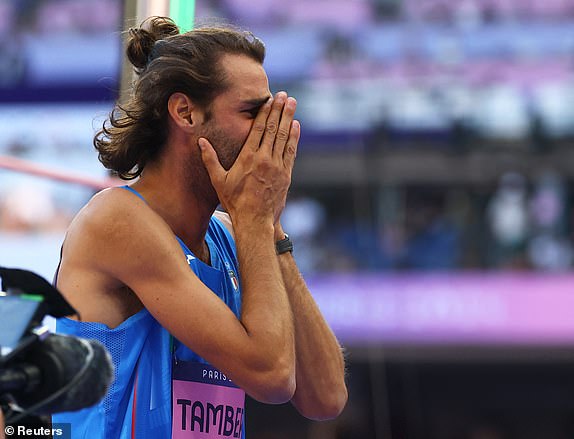 Paris 2024 Olympics - Athletics - Men's High Jump Final - Stade de France, Saint-Denis, France - August 10, 2024.  Gianmarco Tamberi of Italy reacts. REUTERS/Kai Pfaffenbach