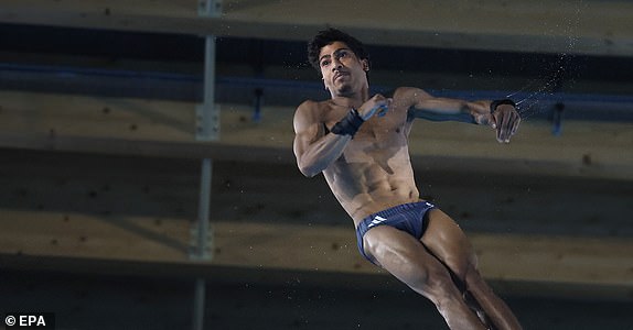 epa11542544 Kyle Kothari of Great Britain in action during the Men's 10m platform final of the Diving competitions in the Paris 2024 Olympic Games, at the Paris Aquatics Centre in Saint Denis, France, 10 August 2024.  EPA/TOLGA AKMEN