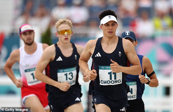 VERSAILLES, FRANCE - AUGUST 09: Joseph Choong of Great Britain competes during the Men's Individual, Semi-Final B, Laser Run on day fourteen of the Olympic Games Paris 2024 at Chateau de Versailles on August 09, 2024 in Versailles, France. (Photo by Maja Hitij/Getty Images)