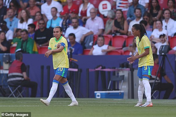 PARIS, FRANCE - AUGUST 10: Marta #10 of Team Brazil enters the pitch during the Women's Gold Medal match between Brazil and United States of America during the Olympic Games Paris 2024 at Parc des Princes on August 10, 2024 in Paris, France. (Photo by Robert Cianflone/Getty Images)