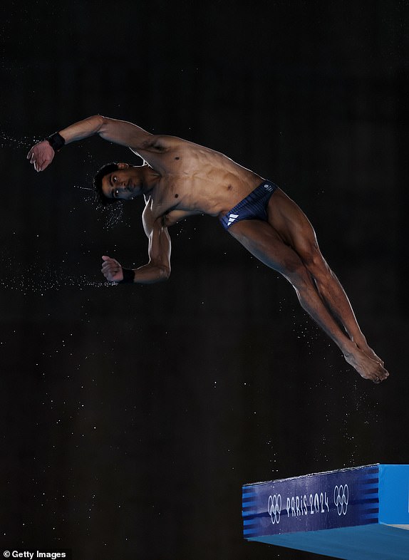 PARIS, FRANCE - AUGUST 10: Kyle Kothari of Team Great Britain competes in the Men's 10m Platform Semifinal on day fifteen of the Olympic Games Paris 2024 at Aquatics Centre on August 10, 2024 in Paris, France. (Photo by Clive Rose/Getty Images)