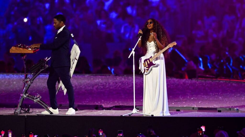 California native H.E.R. sings national anthem at Olympics closing ceremony