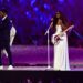 California native H.E.R. sings national anthem at Olympics closing ceremony