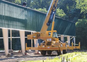 Workers Installing New Roof, Constructing Fields at Grippen Park