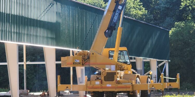 Workers Installing New Roof, Constructing Fields at Grippen Park