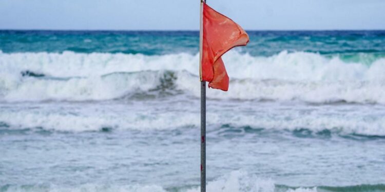 Tropical Storm Ernesto's winds strengthen to near-hurricane force as it departs Puerto Rico