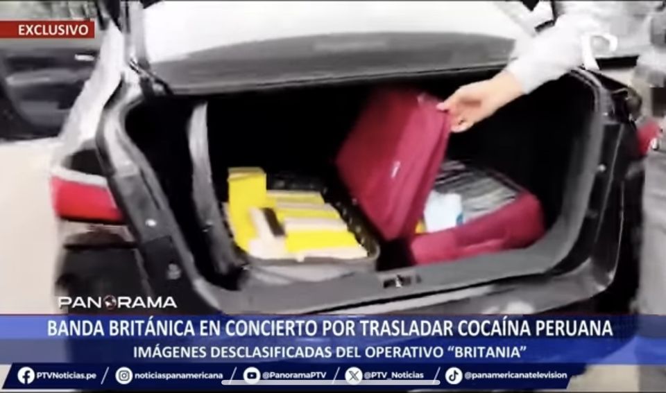 Police cut open packages of cocaine