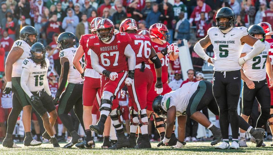 Indiana's Kahlil Benson (67) celebrates an Indiana first down late during the second half of the Indiana versus Michigan State football game at Memorial Stadium on Saturday, Nov. 18, 2023.