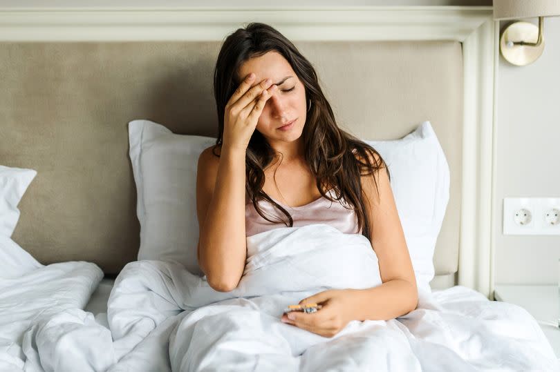 woman lying in bed