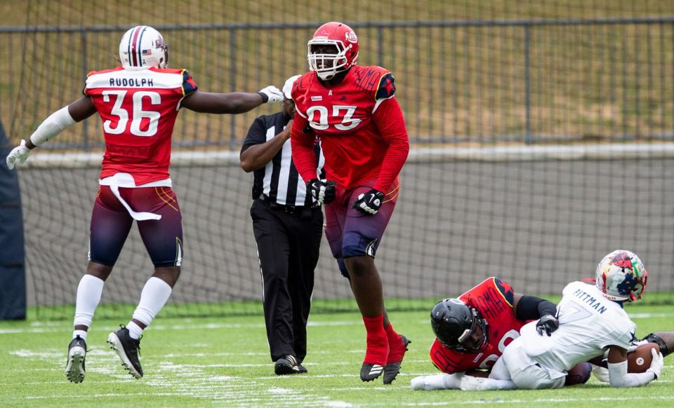 Alabama All-Stars' Anquin Barnes (93) of Lee celebrates after sacking Mississippi All-Stars' Chandler Pittman (7) of Magee at Cramton Bowl in Montgomery, Ala., on Saturday, Dec. 12, 2020. Alabama All-Stars defeated Mississippi All-Stars 19-7.