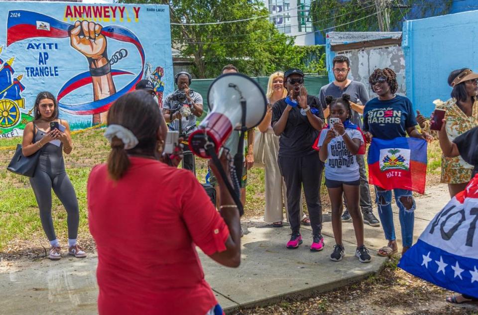 Activist Dr. Flore Lindor Latortue, speaks during a gathering before the departure of a caravan led by Haitian organizers to show support for the Harris campaign that began at the Little Haiti Cultural Center in Miami and traveled to the North Miami Library, on Saturday, August 10, 2024.