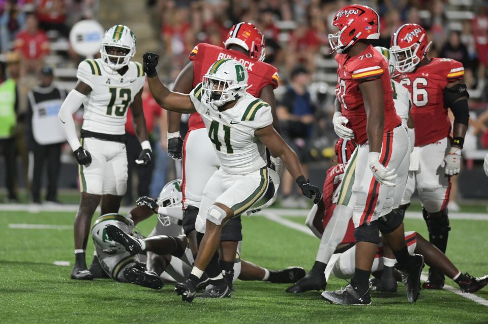 Sep 9, 2023; College Park, Maryland, USA; Charlotte 49ers linebacker Nikhai Hill-Green (41) reacts after stoping Maryland Terrapins offense on third down during the first half at SECU Stadium. Mandatory Credit: Tommy Gilligan-USA TODAY Sports