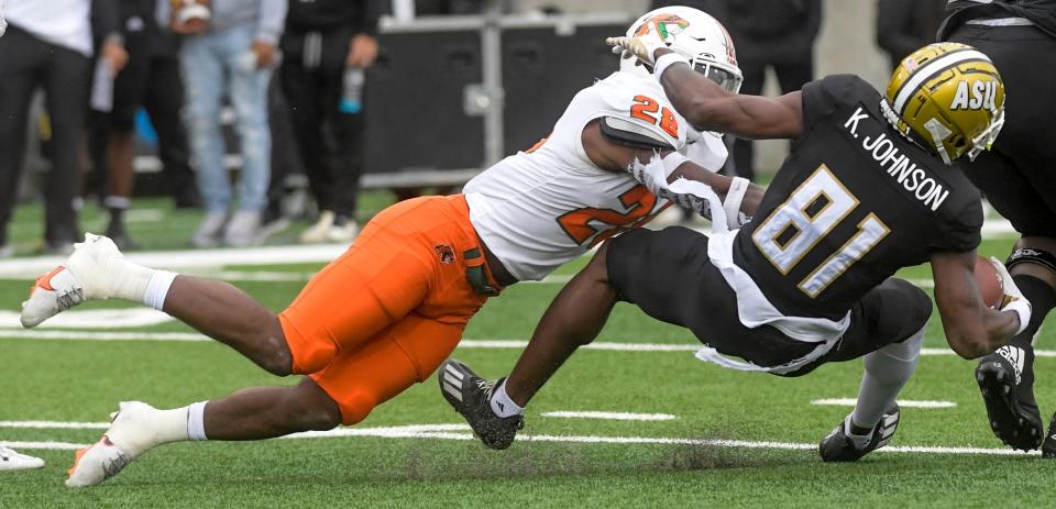 Florida A&M linebacker Johnny Chaney, Jr., (28) stops Alabama State receiver Kisean Johnson (81) during their game at Hornet Stadium in Montgomery, Ala. on Saturday November 12, 2022.

Asu08

Syndication The Montgomery Advertiser