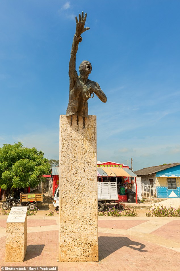 The duke and duchess had time to admire this statue of San Basilio's founder, Benkos Bioho