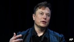 FILE - Tesla and SpaceX CEO Elon Musk speaks at the SATELLITE Conference and Exhibition, March 9, 2020, in Washington. 