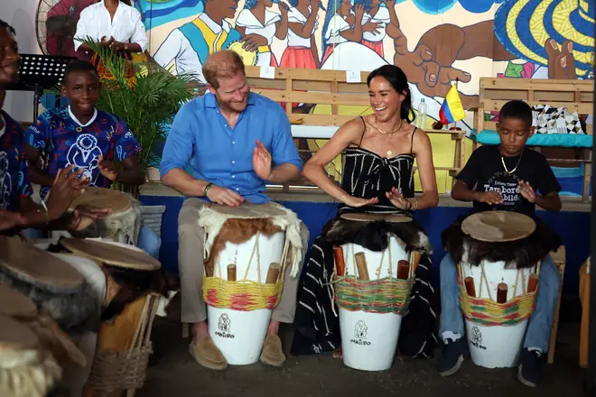 Prince Harry, Duke of Sussex and Meghan, Duchess of Sussex at the Escuela Tambores de Cabildo