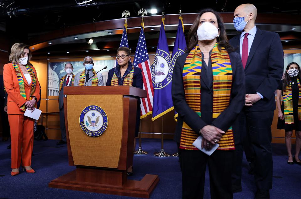 House Speaker Nancy Pelosi listens with Senators Kamala Harris (D-CA) and Cory Booker (D-NJ) as Congressional Black Caucus Chairwoman Representative Karen Bass (D-CA) addresses reporters during a news conference on police reform and racial injustice.