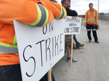 Striking sheet metal workers picket the Canada Royal Milk site in 2019 over hiring practices.