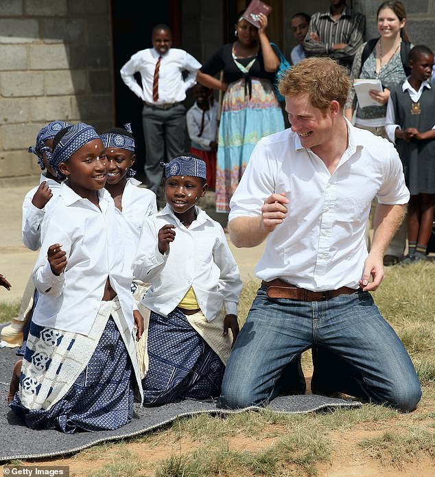 He was filmed trying to master the traditional dance in Lesotho in 2013. In jeans and desert boots, the then 28-year-old took part in an impromptu dance session on his knees in the dust