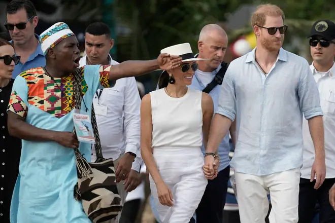 Prince Harry and Meghan arrive to San Basilio de Palenque, Colombia, Saturday, Aug. 17, 2024. (AP Photo/Ivan Valencia)