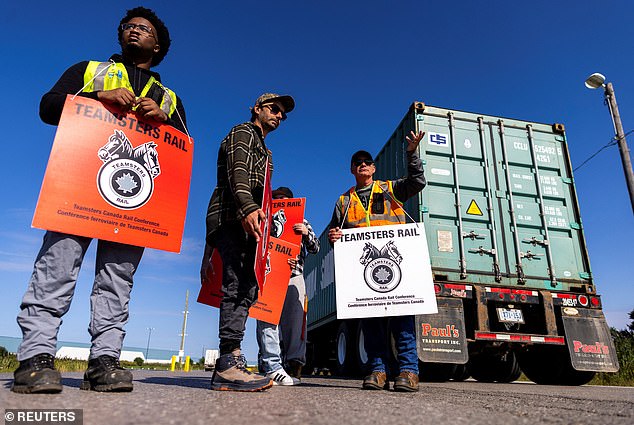 Locked out CPKC workers are seen on the picket line today in Vaughan, Ontario, Canada following unsuccessful contract negotiations