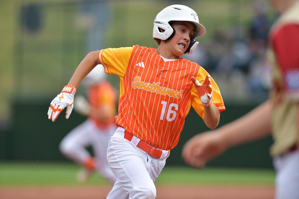 Southwest Region outfielder Ben Burkhart advances to third against Mountain Region in the third inning of the LLWS U.S. semifinal Aug. 21, 2024 at Lamade Stadium in Williamsport, Penn. Southwest, represented by the team from Boerne, Texas beat Henderson, Nevada.