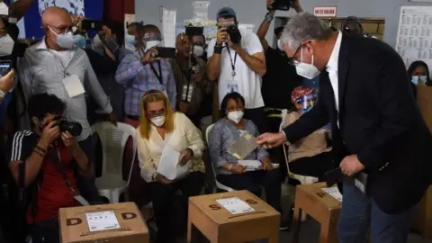 AFP Gonzalo Castillo casts his vote in Santo Domingo, on July 5, 2020