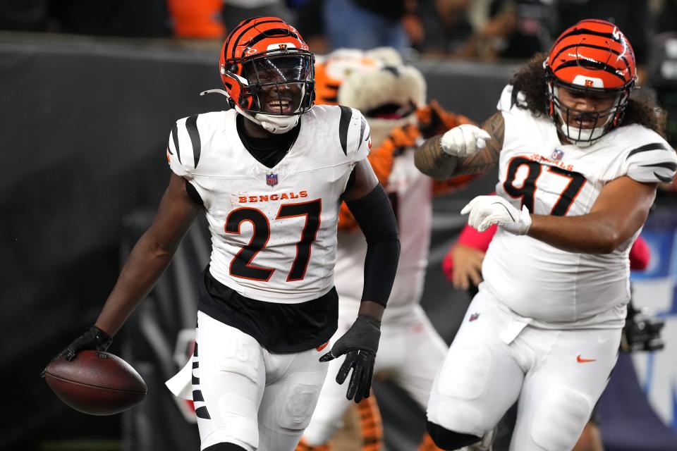 CINCINNATI, OHIO - AUGUST 22: Safety Jordan Battle #27 of the Cincinnati Bengals celebrates a pick 6 during the first quarter of the preseason game against the Indianapolis Colts at Paycor Stadium on August 22, 2024 in Cincinnati, Ohio. (Photo by Jason Mowry/Getty Images)