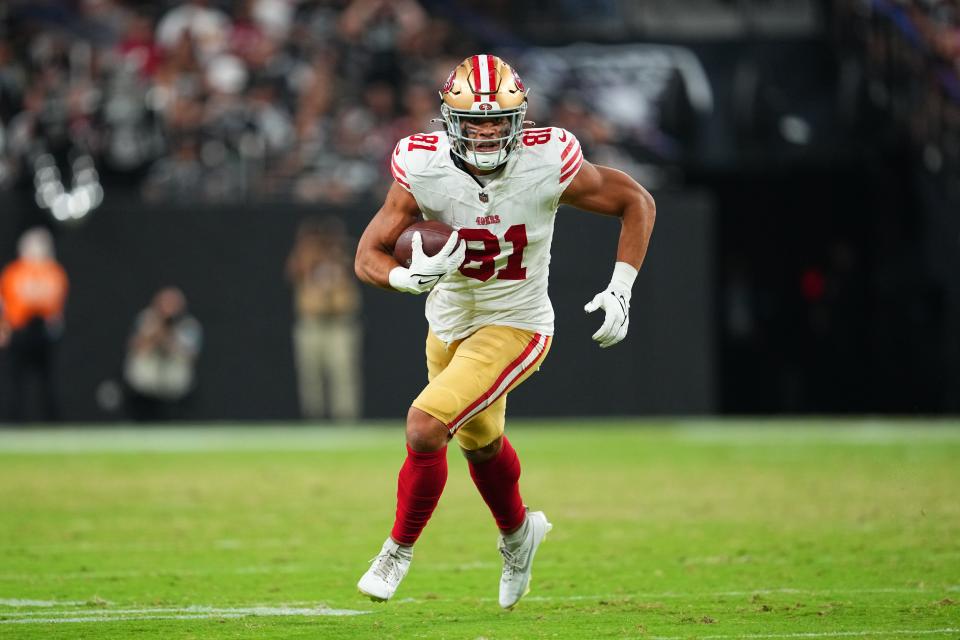 LAS VEGAS, NEVADA - AUGUST 23: Tight end Cameron Latu #81 of the San Francisco 49ers runs against the Las Vegas Raiders during the second half of a preseason game at Allegiant Stadium on August 23, 2024 in Las Vegas, Nevada. (Photo by Chris Unger/Getty Images)