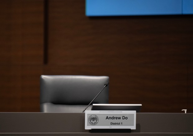 Supervisor Andrew Do’s chair remains empty during a Board of...