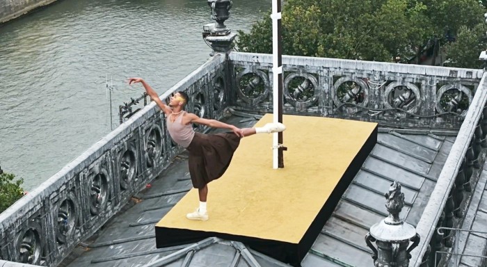 Diop performs on the roof of the Hôtel de Ville in the opening ceremony of the Paris Olympic games, July 2024