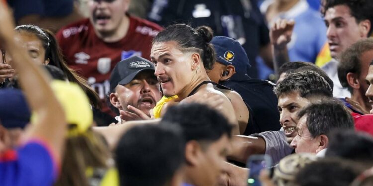 Liverpool star given five-match ban after fight with fans at Copa America | Football