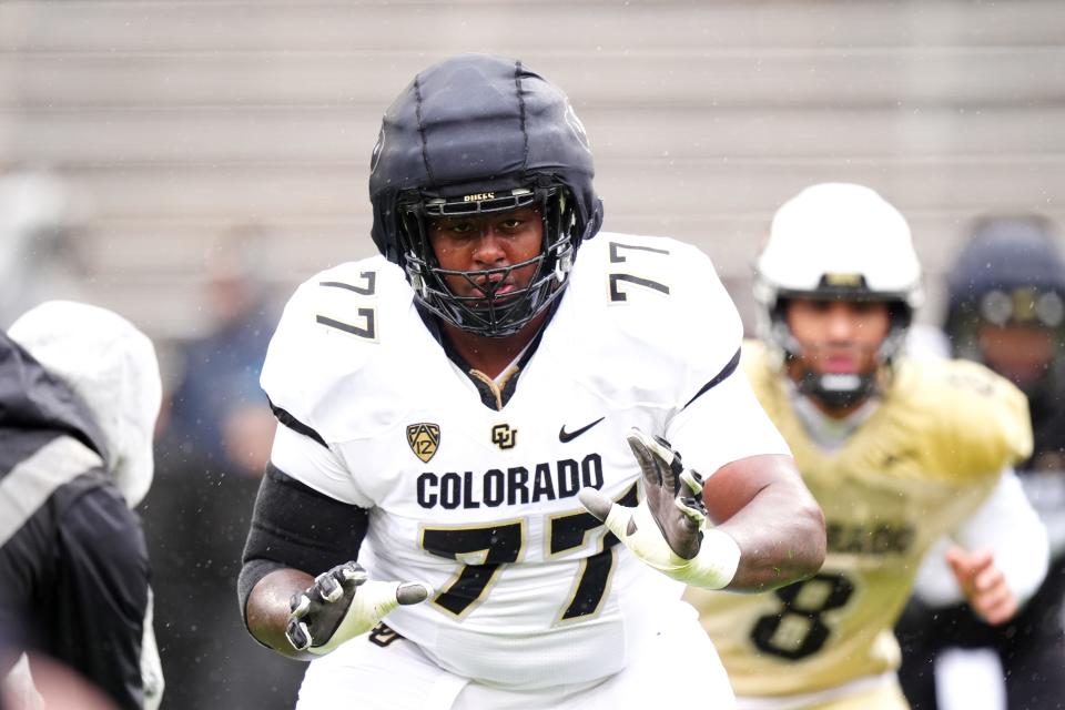 Apr 27, 2024; Boulder, CO, USA; Colorado Buffaloes offensive tackle Jordan Seaton (77) warms up during a spring game event at Folsom Field. Mandatory Credit: Ron Chenoy-USA TODAY Sports