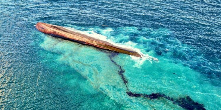 Gunmen storm mystery shipwreck that triggered massive oil spill