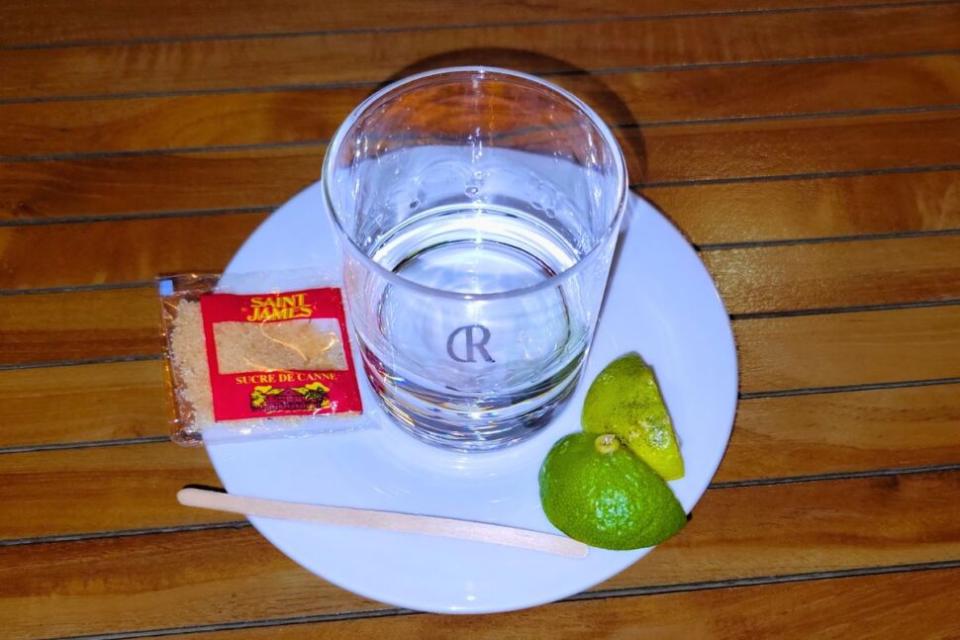 a traditional rum-based Ti-punch served with lime and sugar