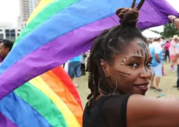 Sean Drakes via Getty Supporters of LGBT rights and equality conclude three weeks of solidarity-building events with a festive parade during the first annual Pride Arts Festival on July 28 in Port of Spain, Trinidad.