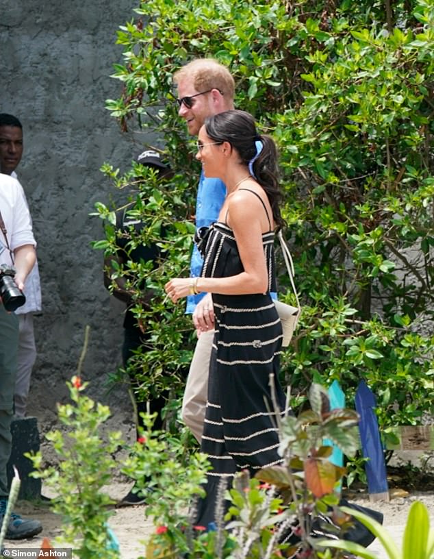 Prince Harry and Meghan Markle on the third day of their visit to Columbia, attending a Caribbean drumming school