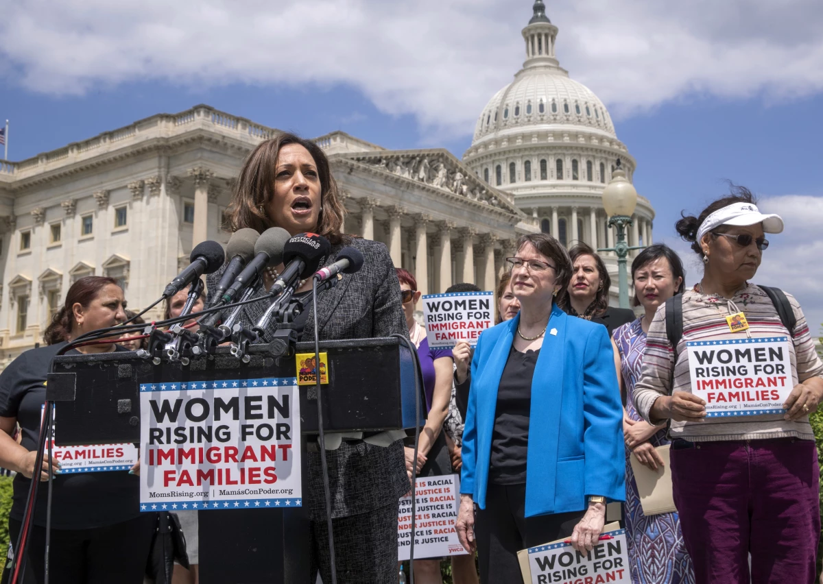 Then-Sen. Kamala Harris, D-Calif., joins a 2018 U.S. Capitol protest against threats by then-President Donald Trump against Central American asylum-seekers to separate children from their parents along the southwest border to deter migrants from crossing into the United States.