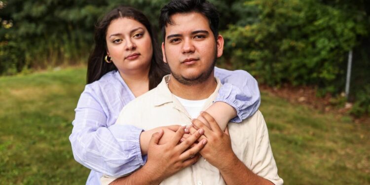 Born in El Salvador, married on LI. Despite legal challenge, citizenship path program gives them hope for better future