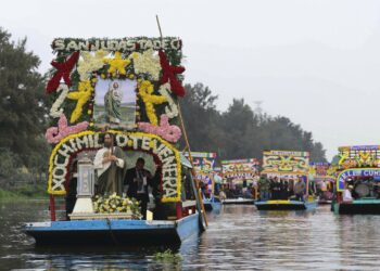 Catholic devotees honor St Jude's relic with watery procession through Mexico's Xochimilco canals