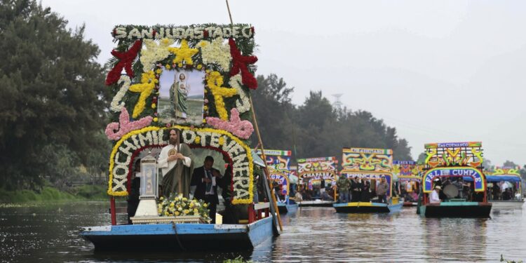 Catholic devotees honor St Jude's relic with watery procession through Mexico's Xochimilco canals