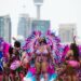 Costumed dancers and mas bands add sizzle to a sweltering day at the Toronto Caribbean Carnival Grand Parade