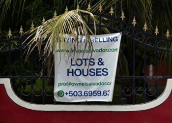 A sign advertising property in El Salvador.